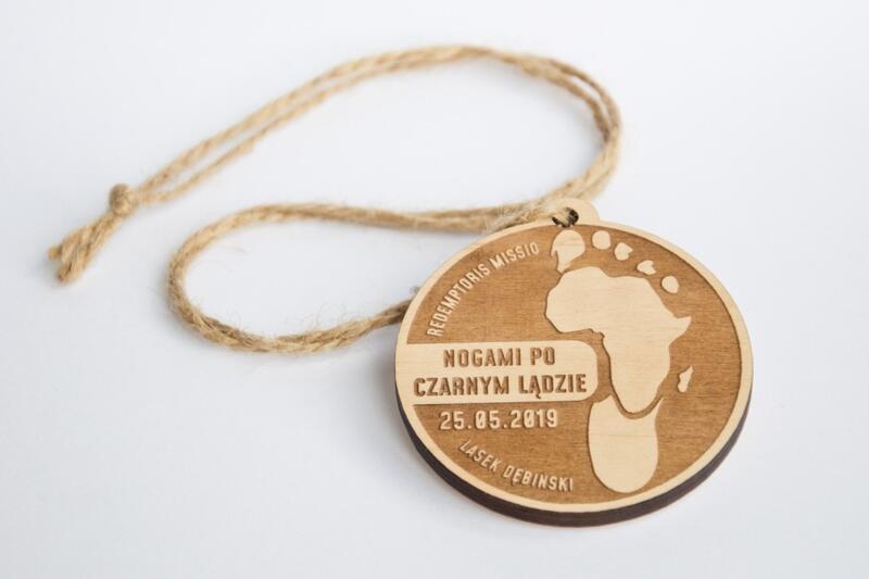 Powiększ obraz: Medal z tekstem: Nogami po czarnym lądzie 25.05.2019 redemptoris Missio, Lasek Dębiński